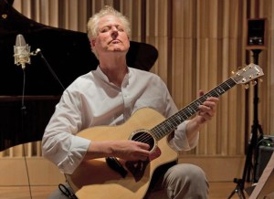 Shambhu recording guitar tracks